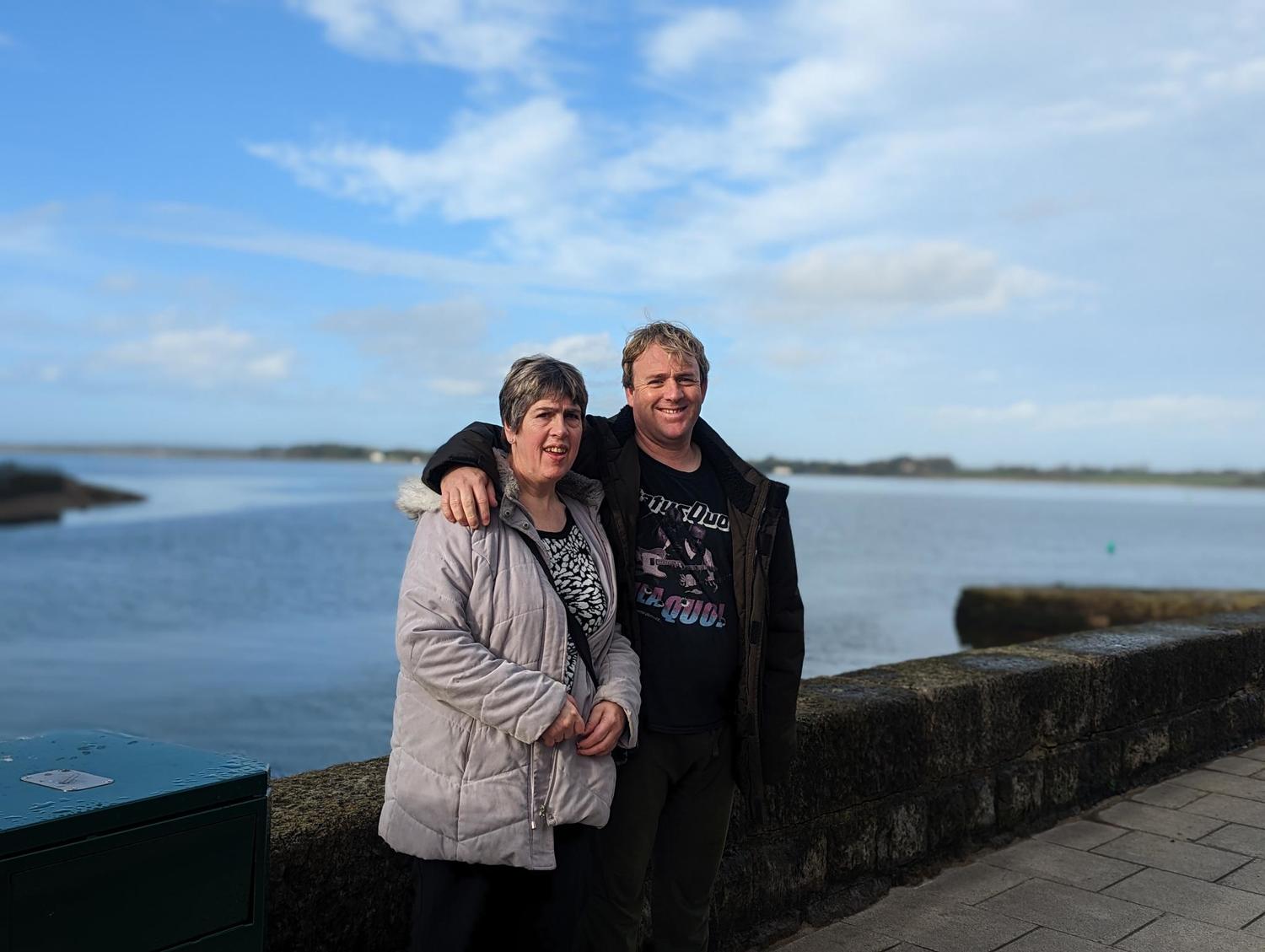 Two people standing together in Wales