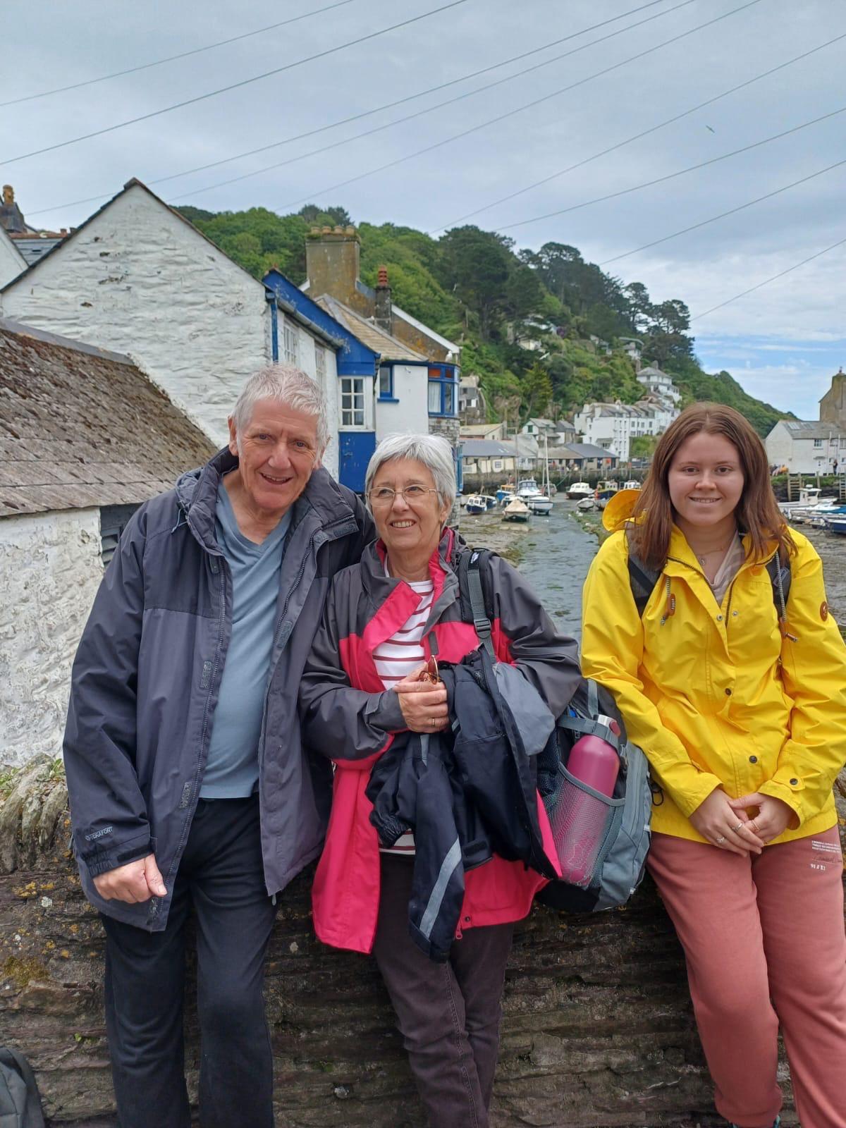 Shared Lives family standing together on holiday