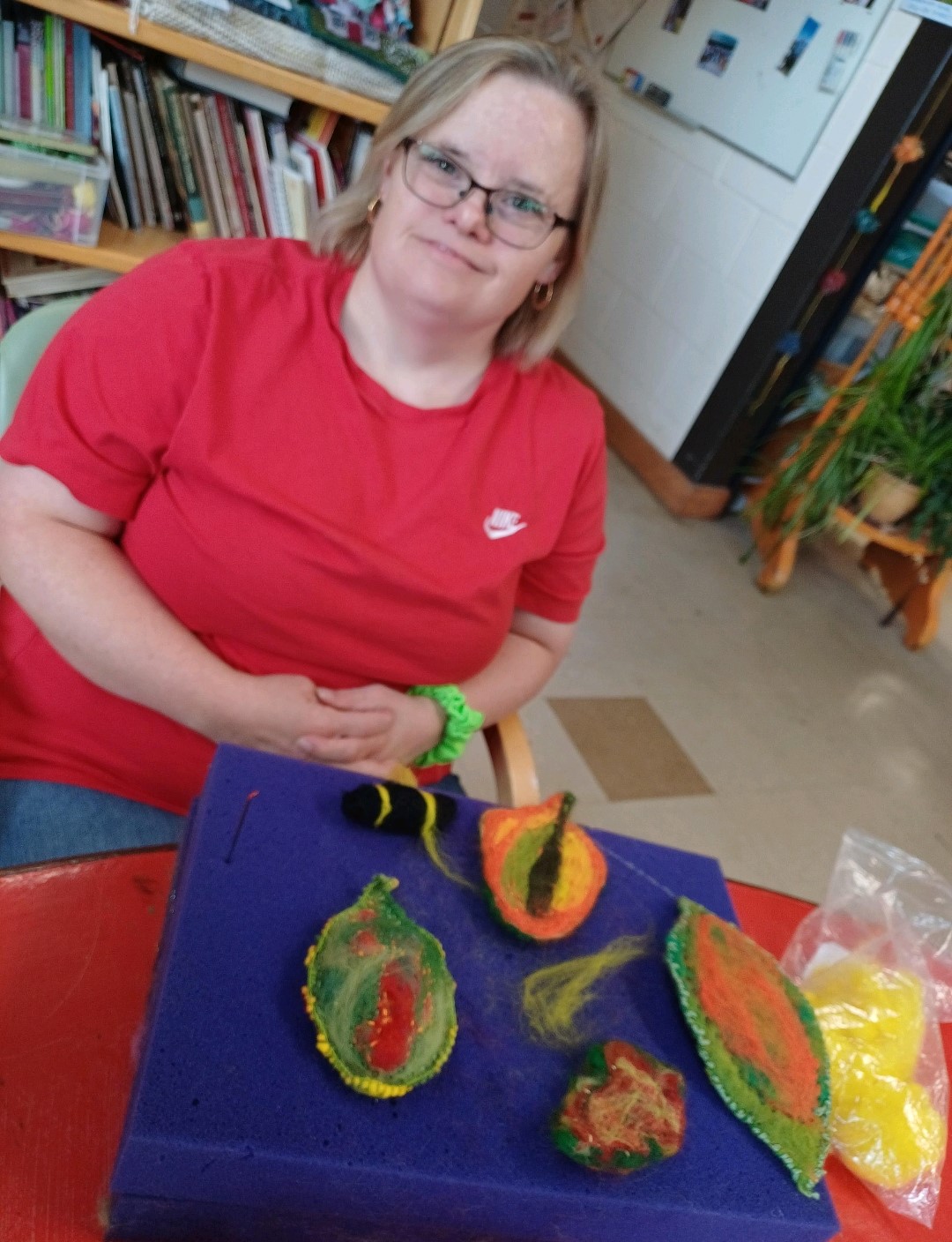 A person we support needle felting leaves