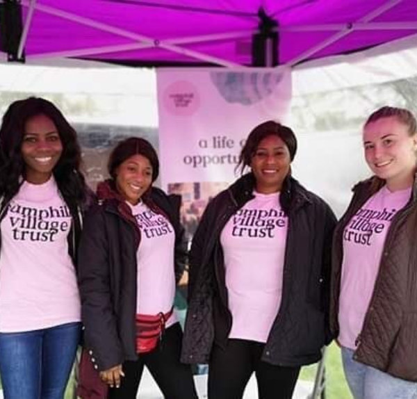 Staff wearing Camphill Village Trust t shirts