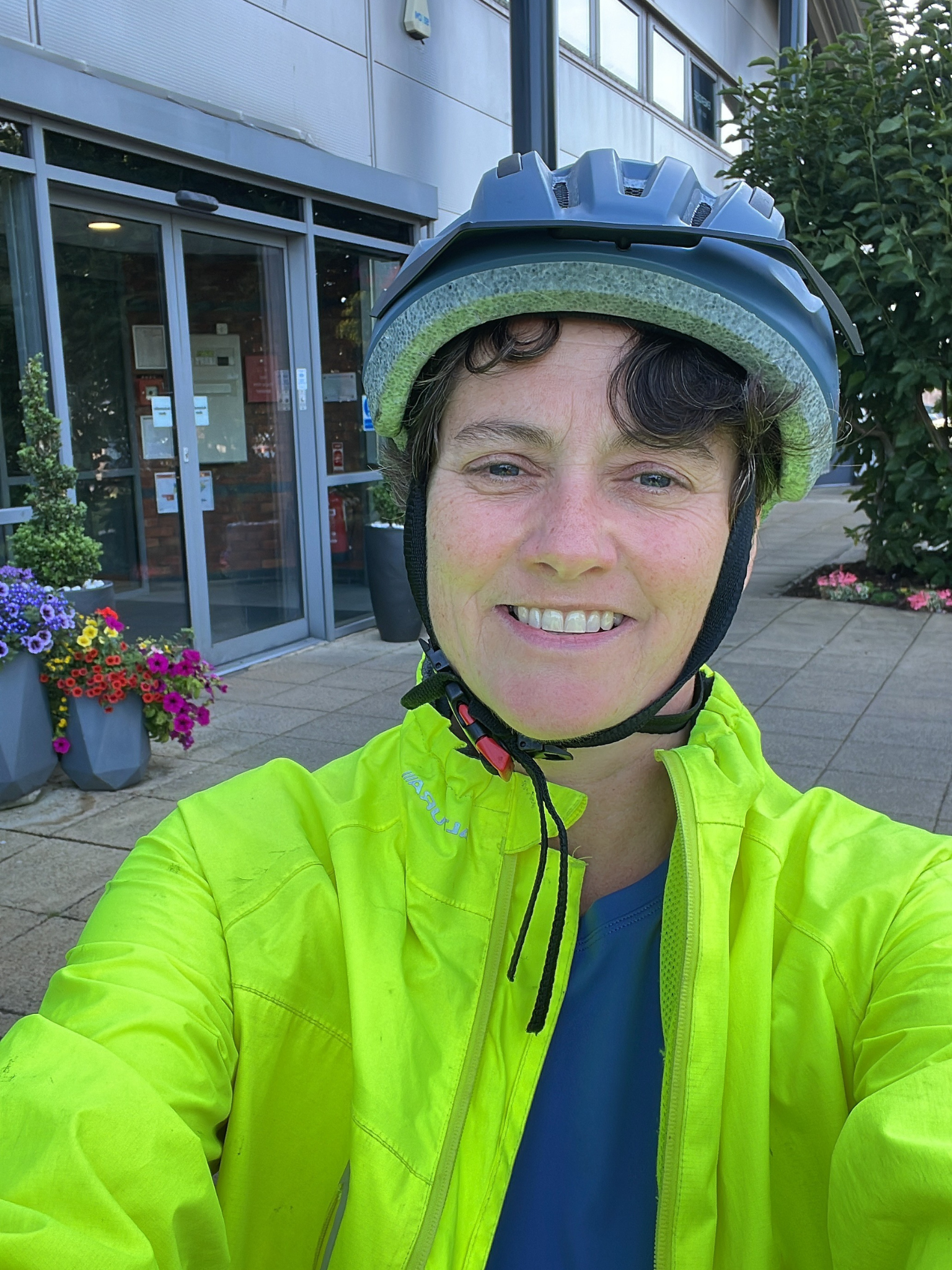 Our Director Claire cycling to the gym