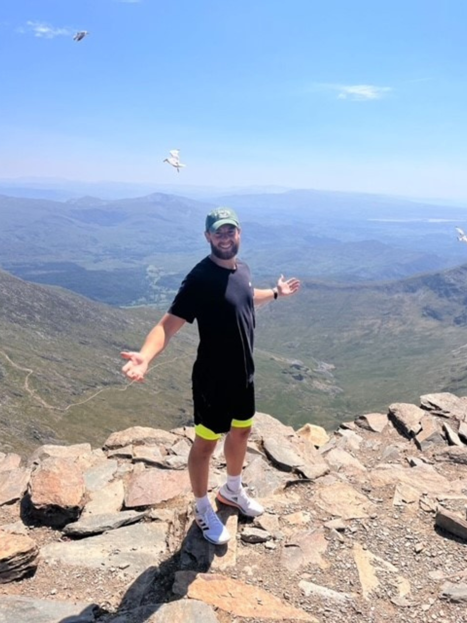 A man hiking up a mountain